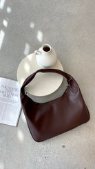 Brown Faux Leather Hobo Bag with Silver Zip Closure and Internal Pocket – Stylish Shoulder Handbag for Everyday Use 0