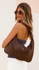 Brown Faux Leather Hobo Bag with Silver Zip Closure and Internal Pocket – Stylish Shoulder Handbag for Everyday Use 2